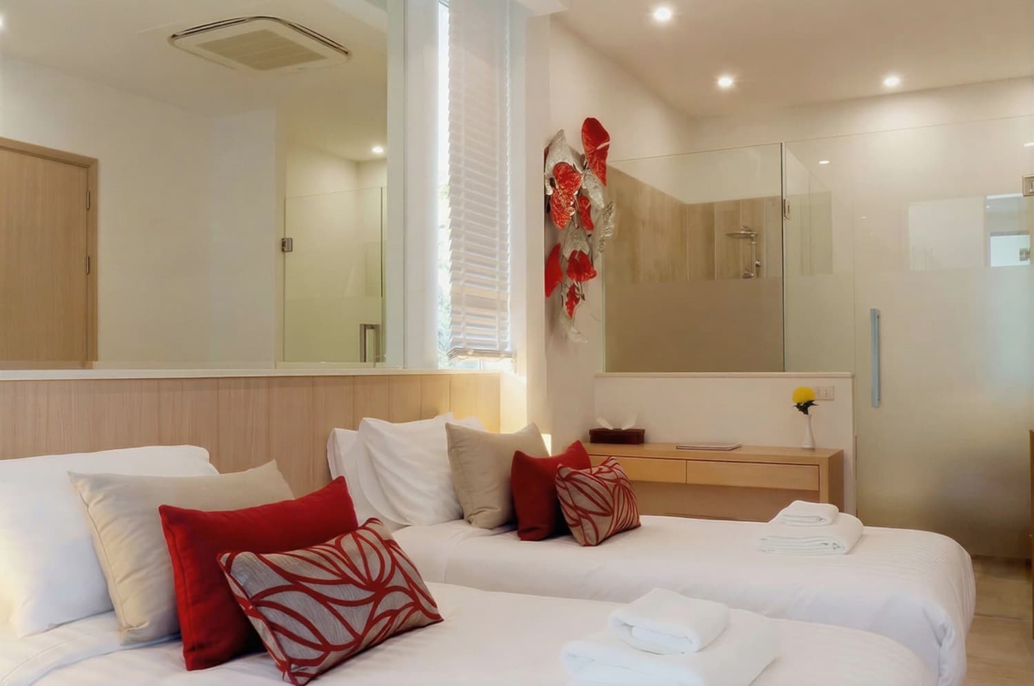 Twin bedroom with walk-in rain shower en-suite