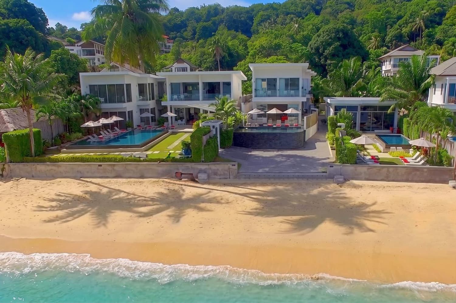The villa's beachfront seen from the air