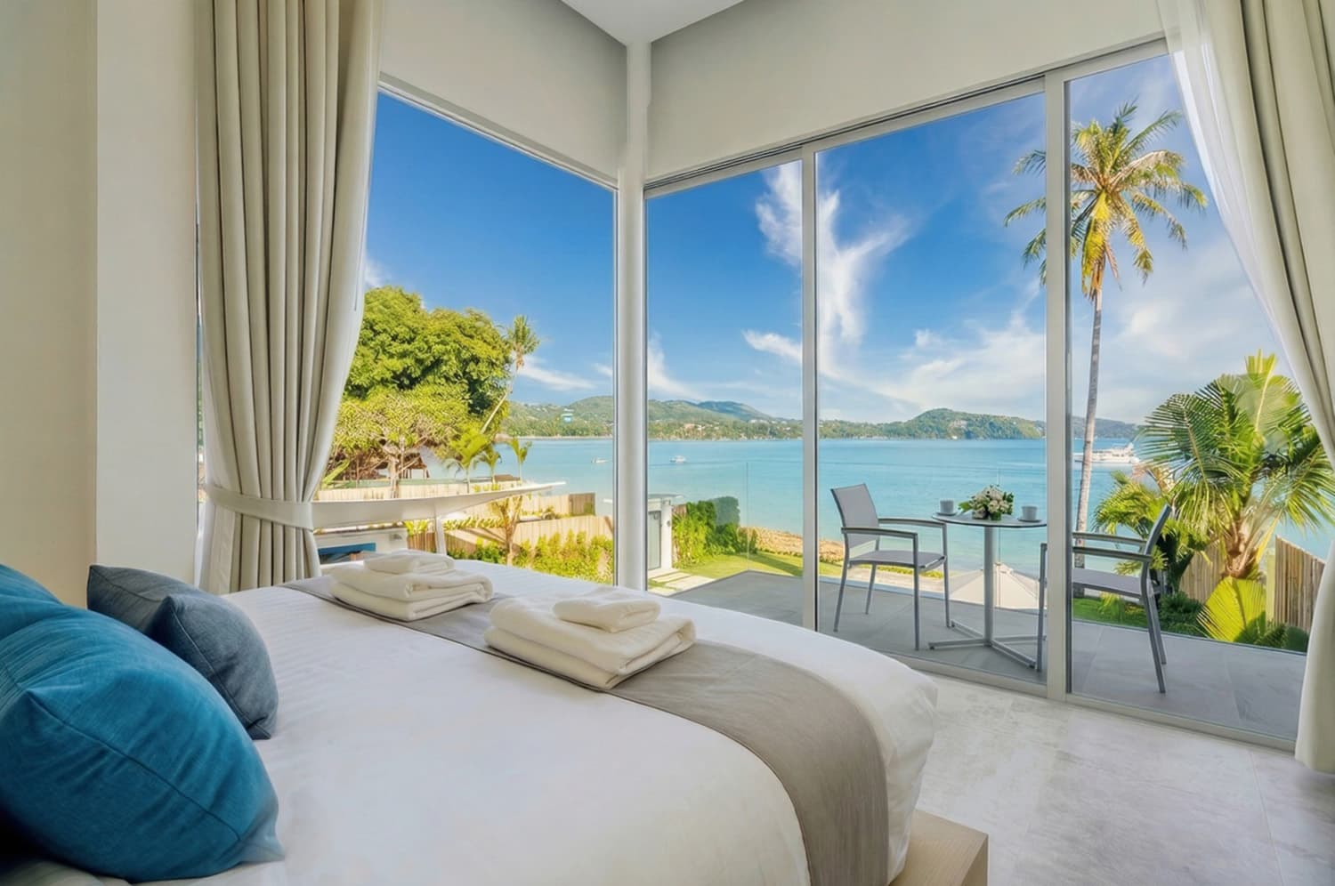 Bedroom with floor-to-ceiling views over Ao Yon Bay