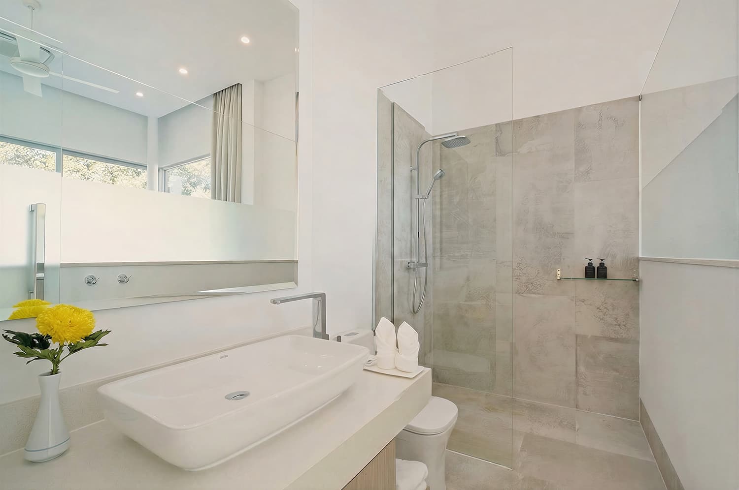 Marble en-suite bathroom with walk-in rain shower