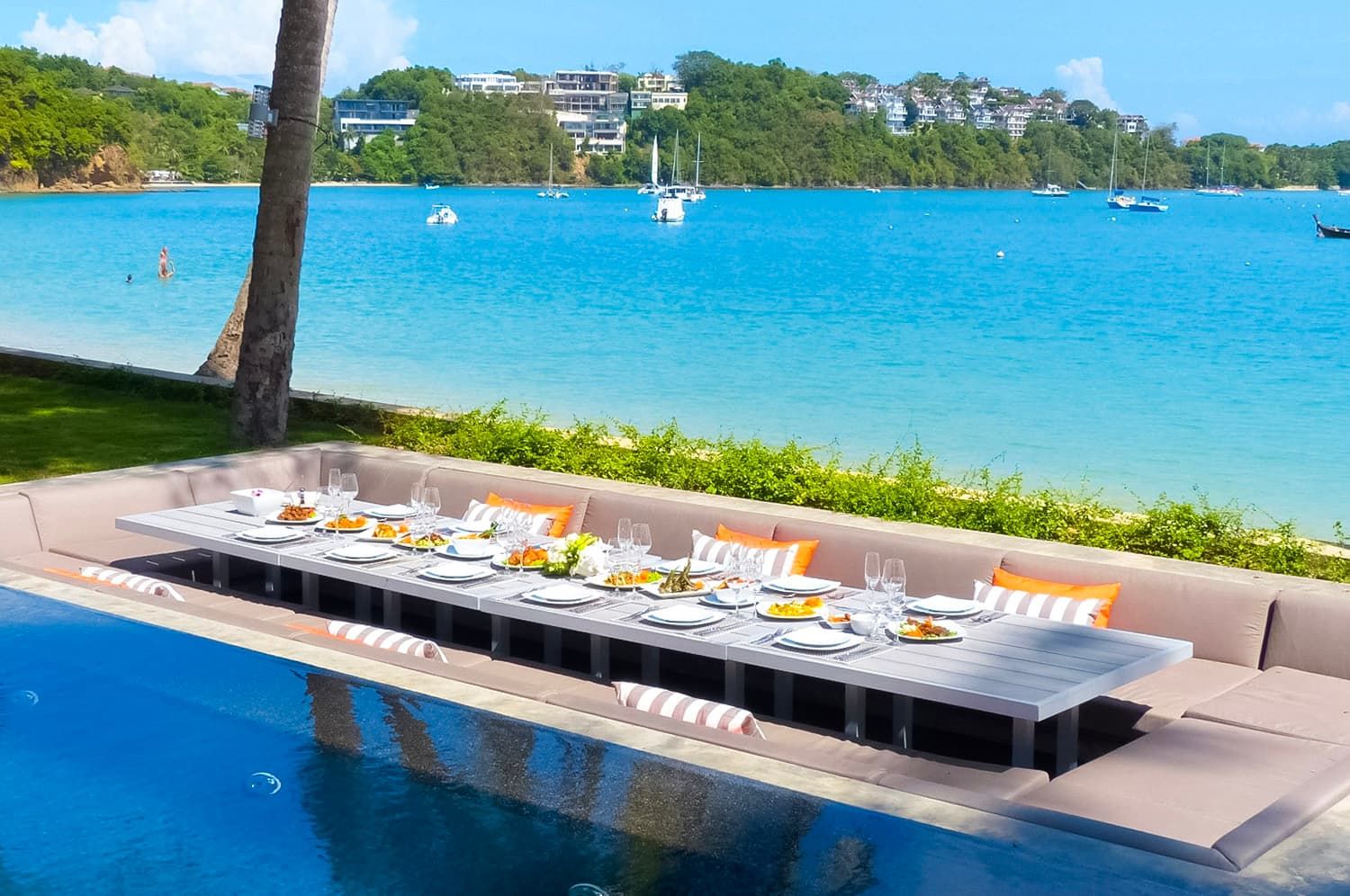 Sunken poolside dining table